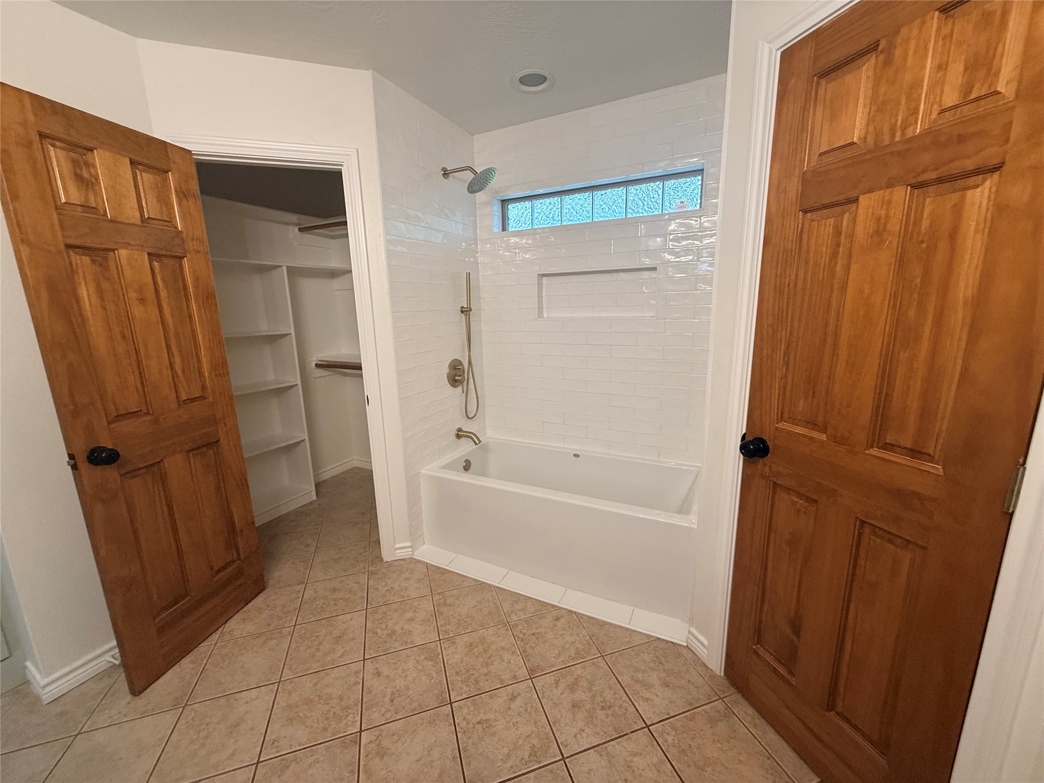 855 County Road 2267 Cleveland, TX 77327 - Photo 9 of 24 a bathroom with a bathtub and shower