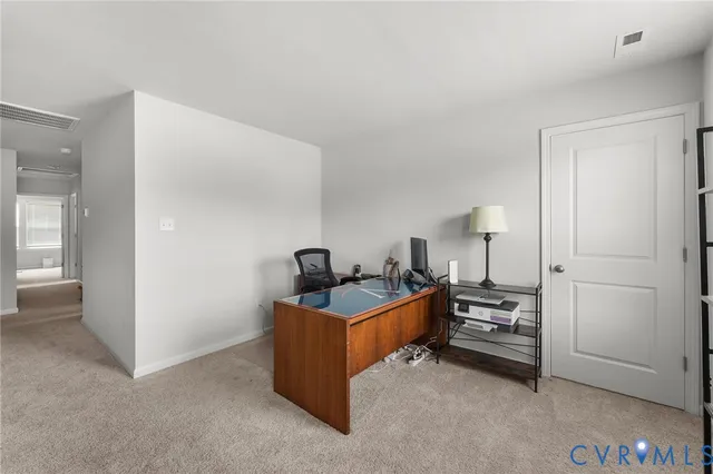 a bedroom with a bed and a cabinets