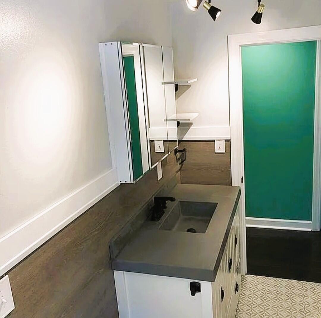2698 County Line Road Lake Station, IN 46405 - Photo 13 of 22 a bathroom with a sink and a mirror