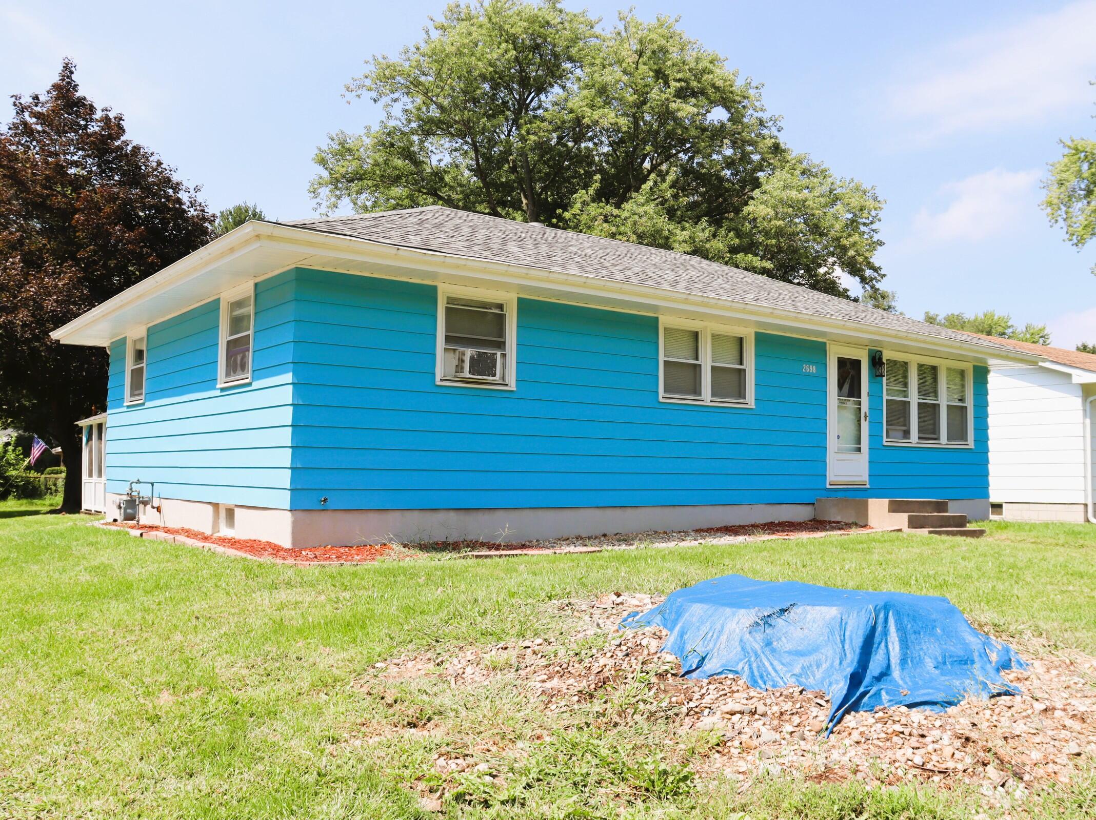 2698 County Line Road Lake Station, IN 46405 - Photo 3 of 22 a view of a house with a yard