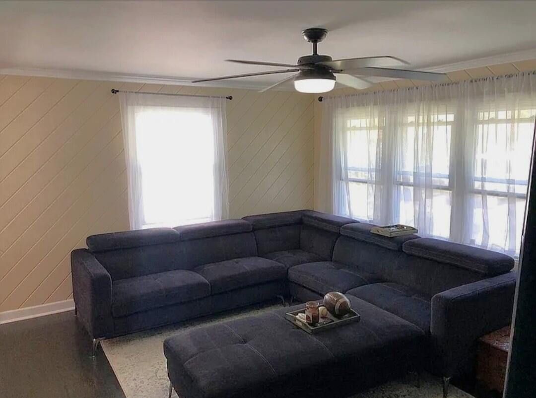 2698 County Line Road Lake Station, IN 46405 - Photo 5 of 22 a living room with furniture and a window