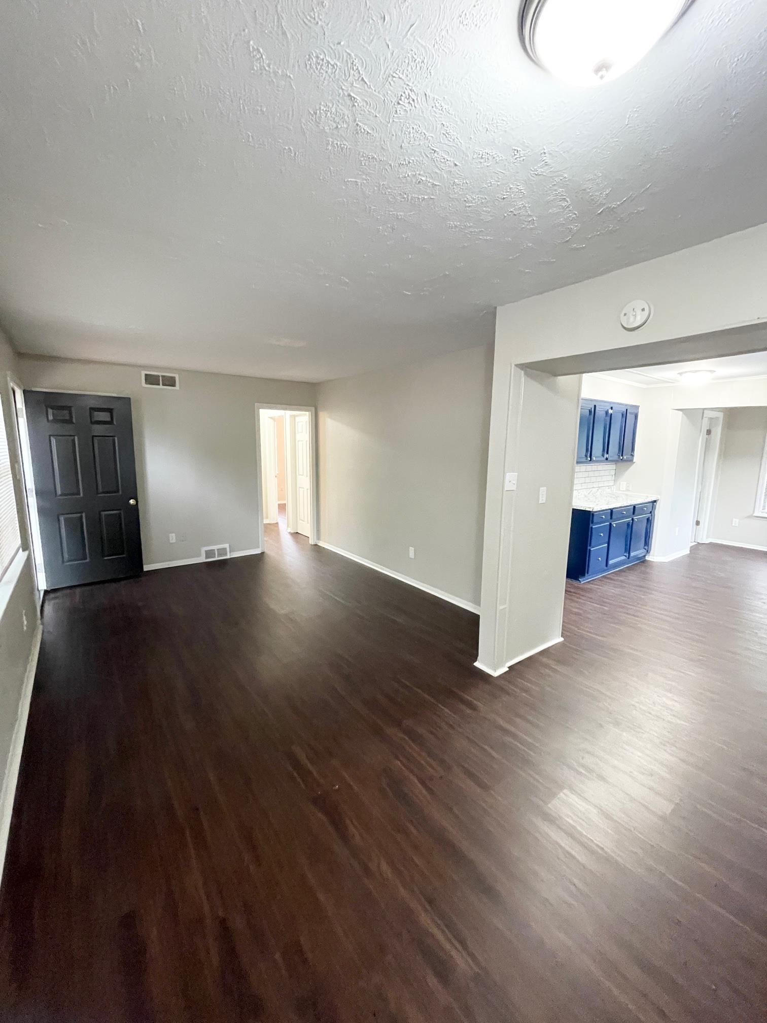2952 Randy Lane Memphis, TN 38118 - Photo 3 of 11 a view of an empty room with wooden floor