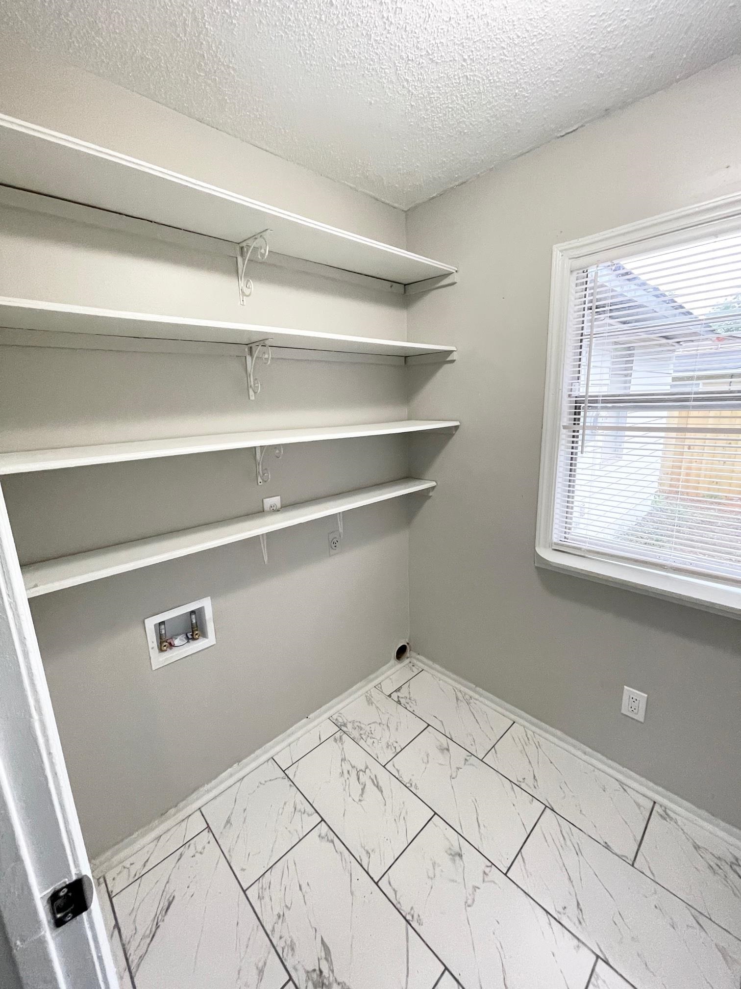 2952 Randy Lane Memphis, TN 38118 - Photo 6 of 11 a view of a rack on the wall