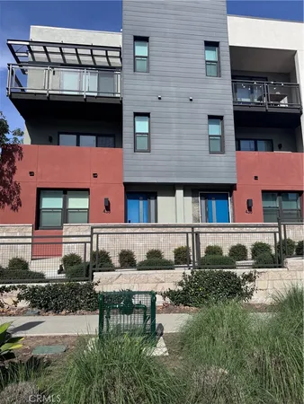 a front view of a building with balcony