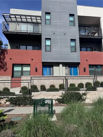 a front view of a building with balcony