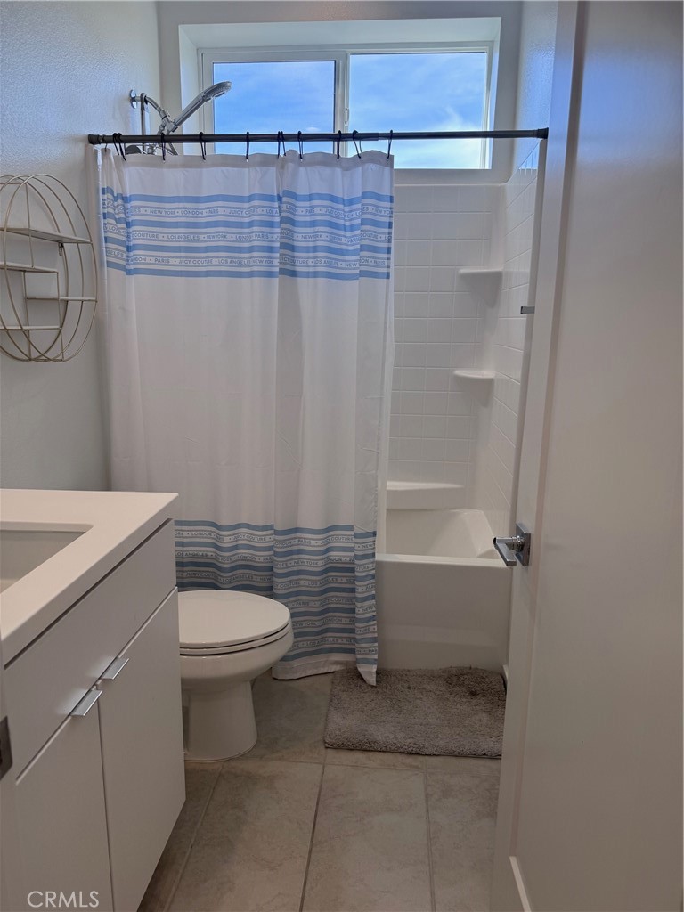 438 Hudson Street Brea, CA 92821 - Photo 28 of 29 a bathroom with a sink a toilet and shower