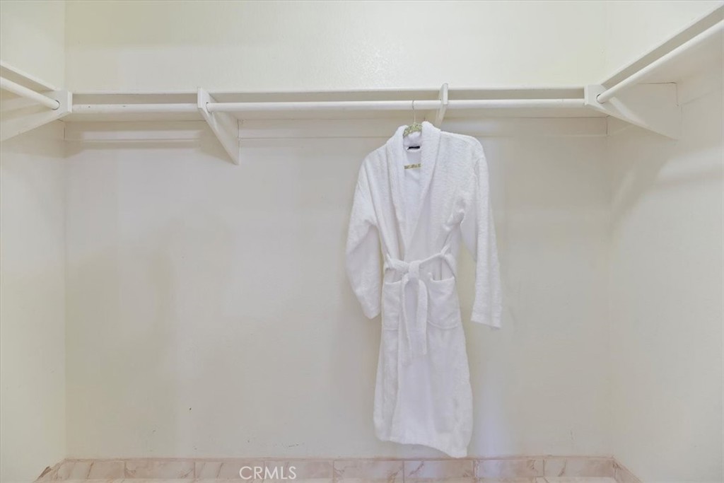 39557 Warbler Drive Temecula, CA 92591 - Photo 21 of 30 Primary bedrooms closet area w/shelving~