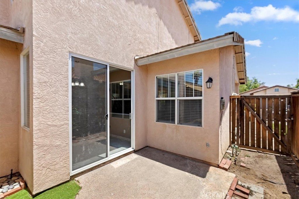 39557 Warbler Drive Temecula, CA 92591 - Photo 22 of 30 Outdoor patio area. Easy care landscape w/turf.
