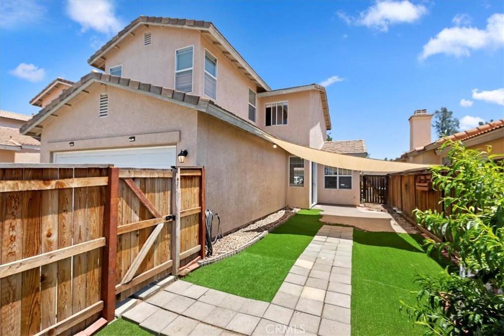 39557 Warbler Drive Temecula, CA 92591 - Photo 24 of 30 Easy care side yard w/ turf & sunshade for cover~