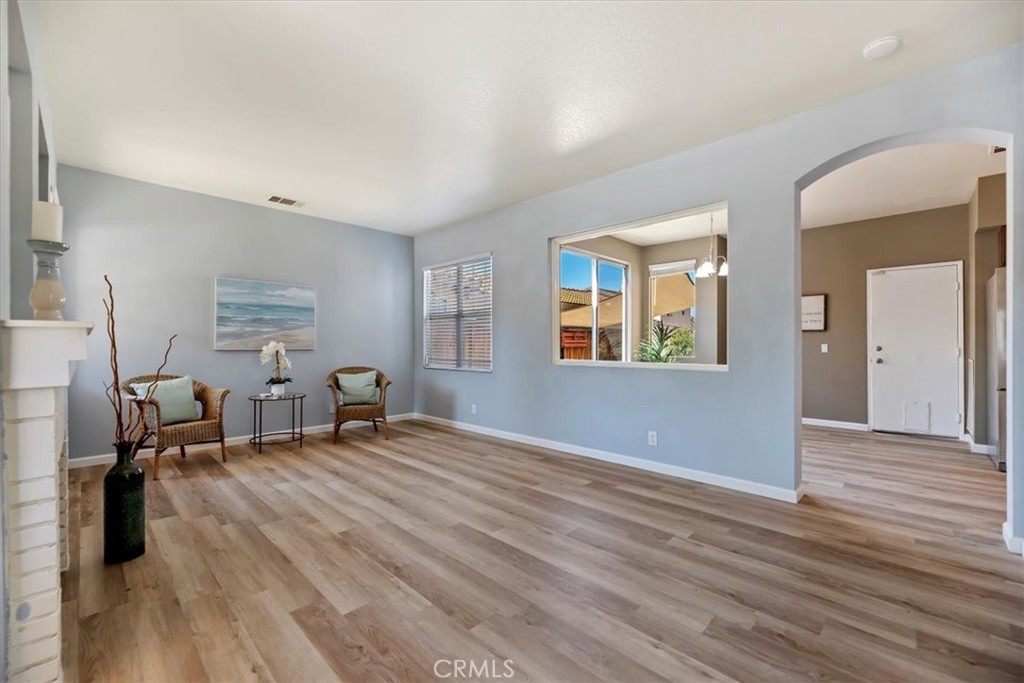 39557 Warbler Drive Temecula, CA 92591 - Photo 7 of 30 New baseboards & laminate floors! Soft colors for accent!