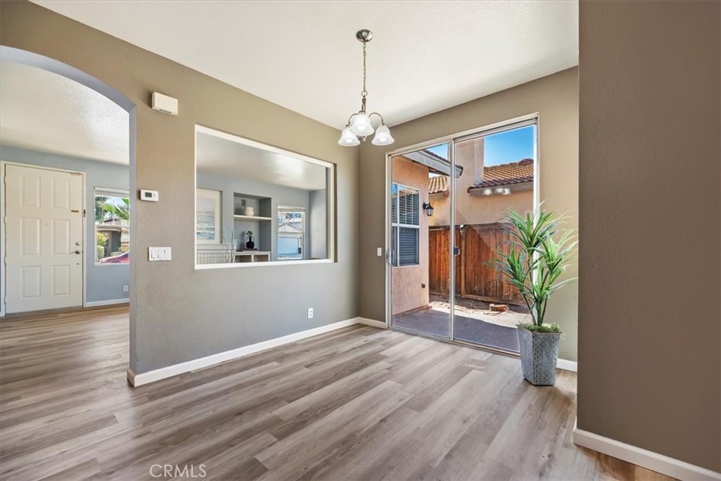 39557 Warbler Drive Temecula, CA 92591 - Photo 8 of 30 Separate dining area opens to living area & outdoor patio area~