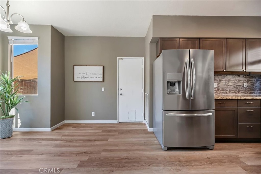 39557 Warbler Drive Temecula, CA 92591 - Photo 9 of 30 Separate dining area opens to living area too!