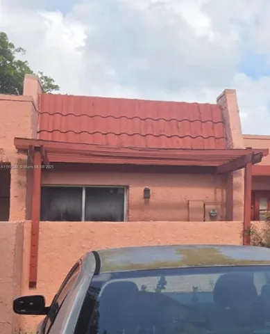 a view of house with front door
