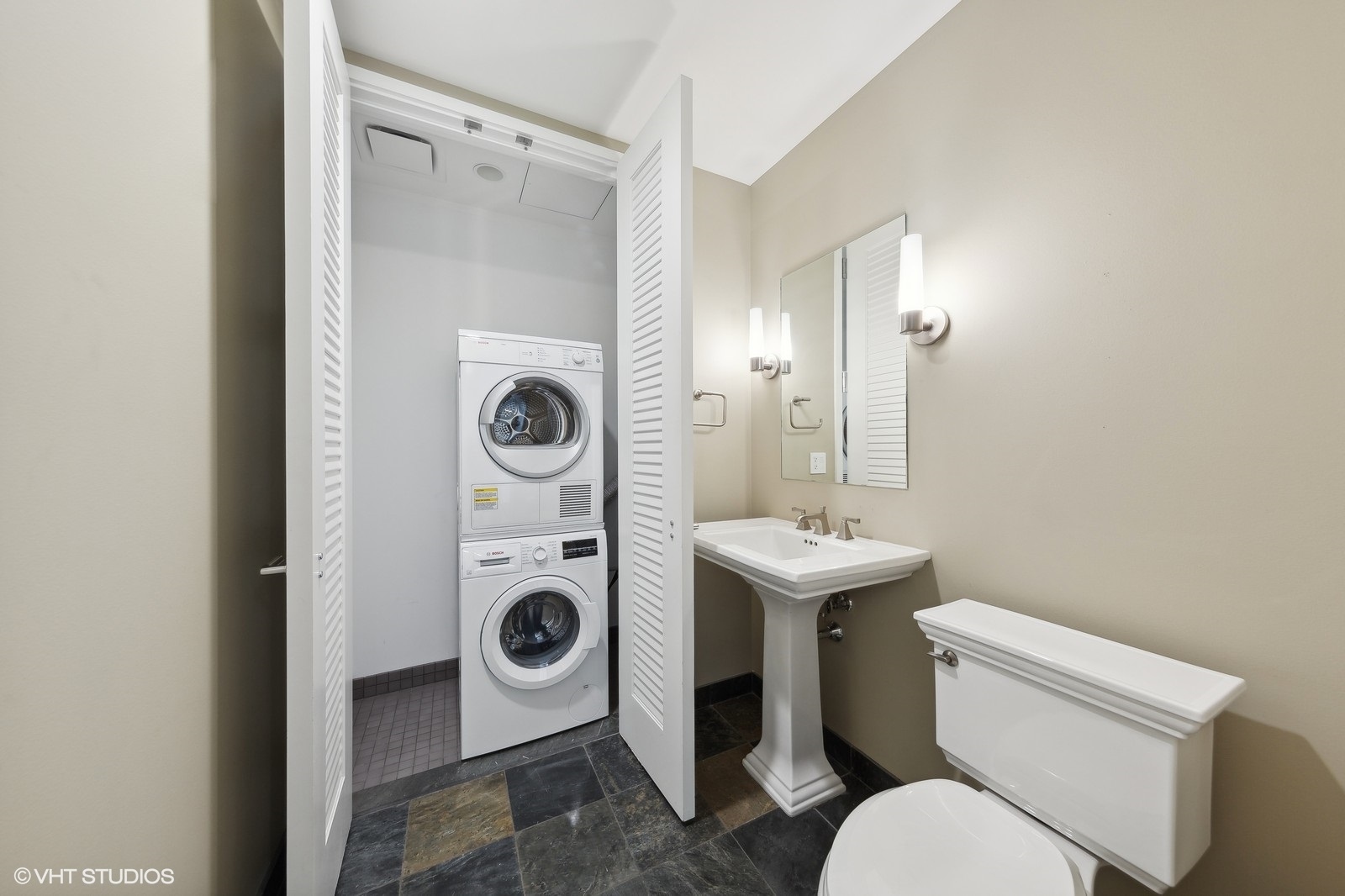 401 North Wabash Avenue, Unit 56B Chicago, IL 60611 - Photo 5 of 17 a bathroom with a sink and a toilet