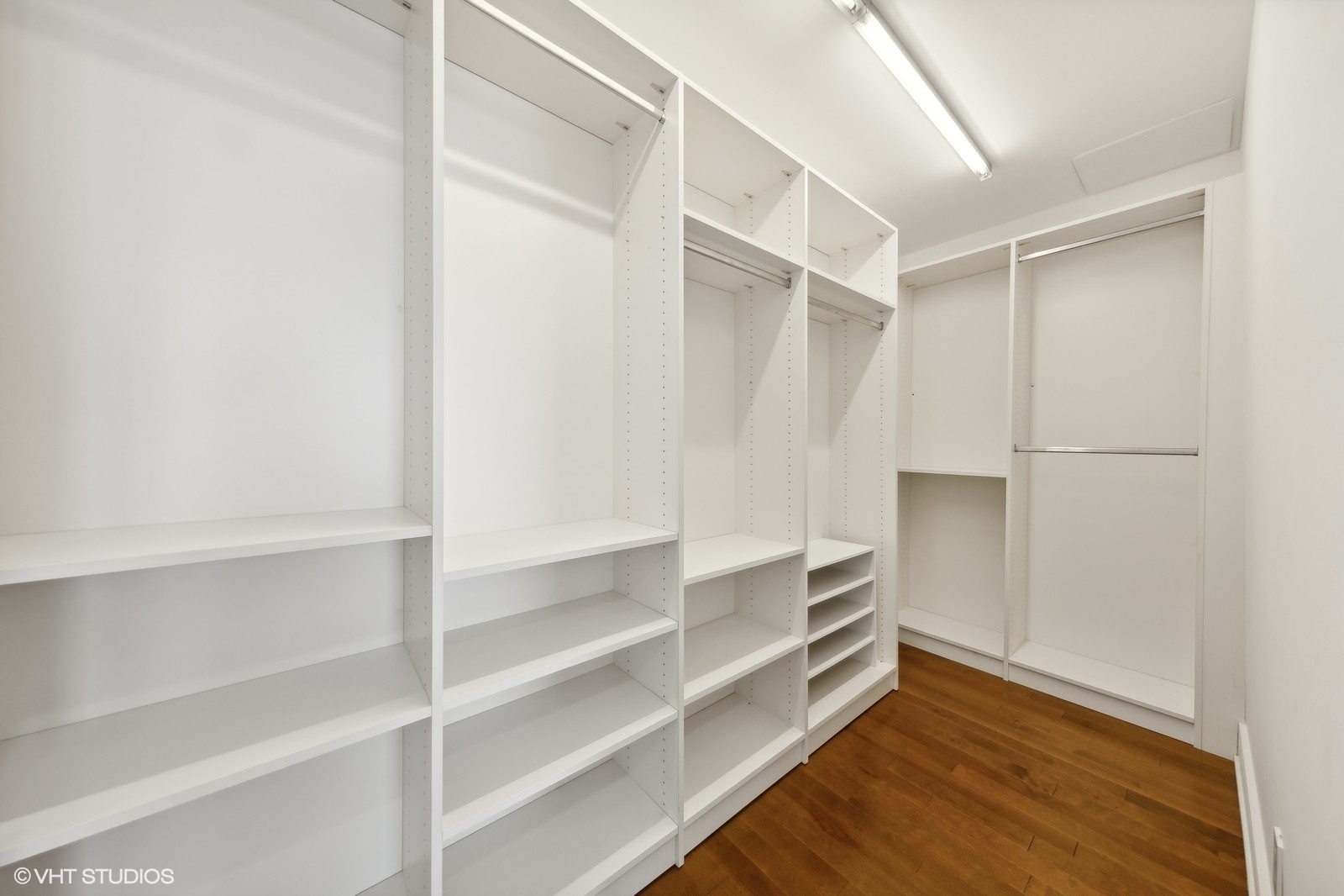 401 North Wabash Avenue, Unit 56B Chicago, IL 60611 - Photo 6 of 17 a view of walk in closet with empty racks