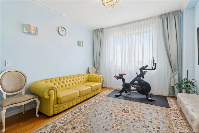 a bedroom with bed and a window