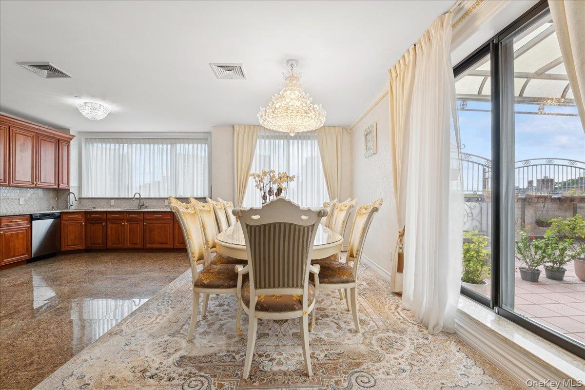 99-31 66th Avenue, Unit 7B Queens, NY 11374 - Photo 7 of 26 a view of a dining room with furniture a chandelier and wooden floor