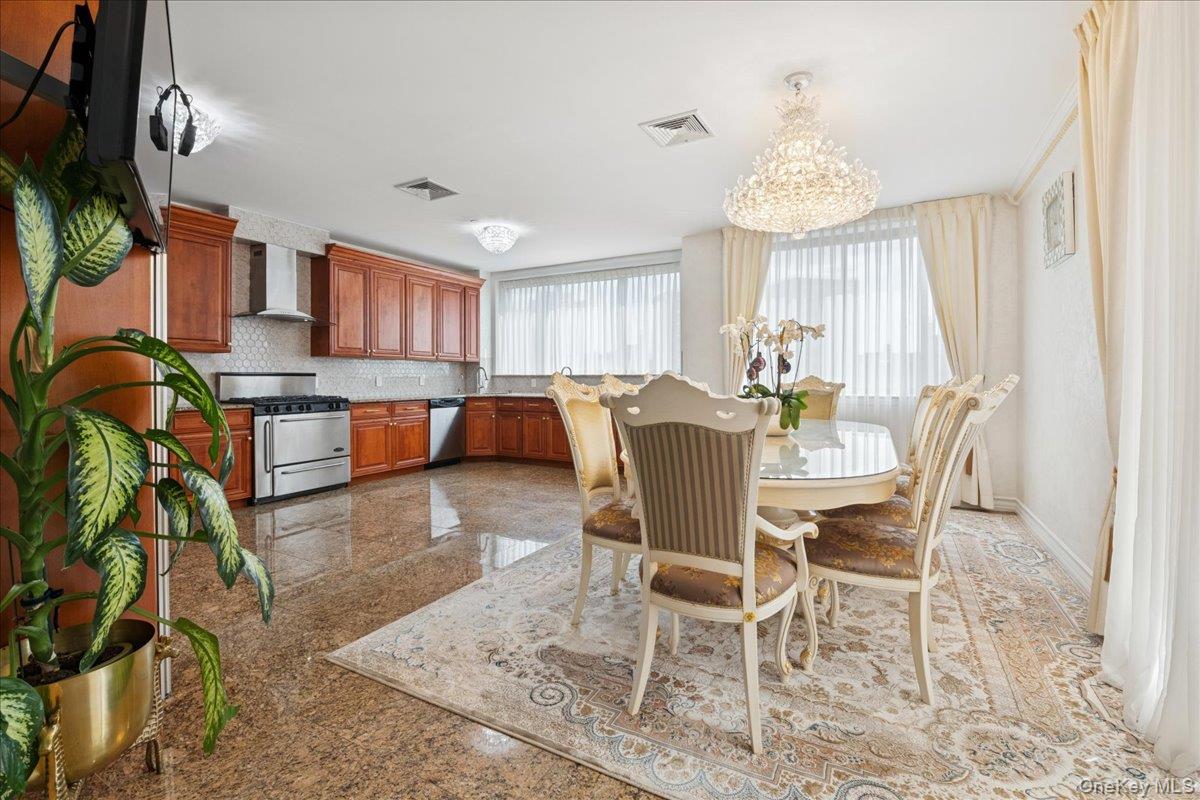 99-31 66th Avenue, Unit 7B Queens, NY 11374 - Photo 8 of 26 a view of a dining room with furniture