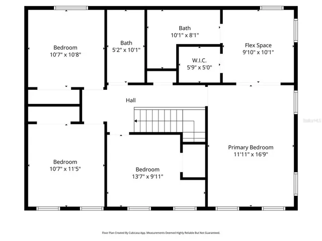 a bathroom with a granite countertop sink a toilet a mirror and shower