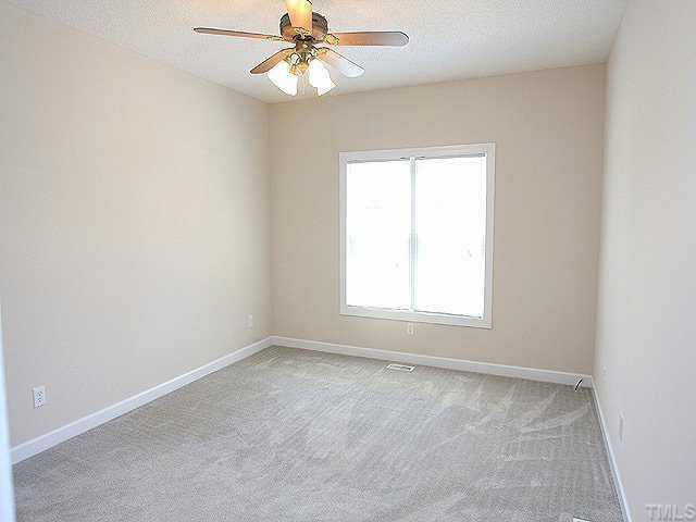 1900 Johnston County Road Benson, NC 27504 - Photo 6 of 9 Nice Master Bedroom with Ceiling Fan and Large Window. Master Bedroom