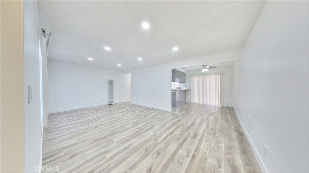 1648 Vía Mirada, Unit B Fullerton, CA 92833 - Photo 17 of 30 a view of empty room with wooden floor