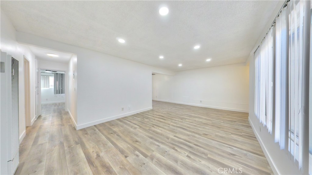 1648 Vía Mirada, Unit B Fullerton, CA 92833 - Photo 18 of 30 a view of hallway with wooden floor