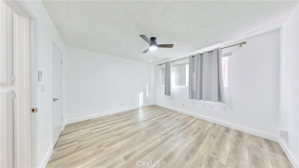 1648 Vía Mirada, Unit B Fullerton, CA 92833 - Photo 27 of 30 a view of an empty room with a window