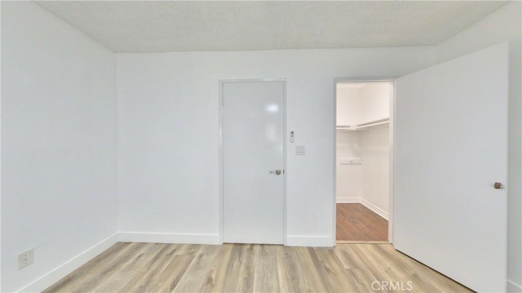 1648 Vía Mirada, Unit B Fullerton, CA 92833 - Photo 29 of 30 a view of small space with wooden floor