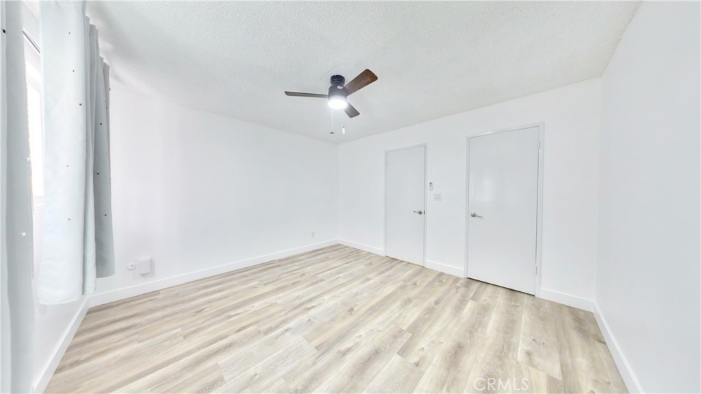 1648 Vía Mirada, Unit B Fullerton, CA 92833 - Photo 30 of 30 a view of empty room with ceiling fan
