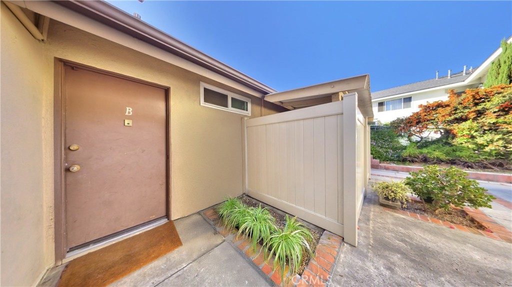 1648 Vía Mirada, Unit B Fullerton, CA 92833 - Photo 4 of 30 a house with a outdoor space