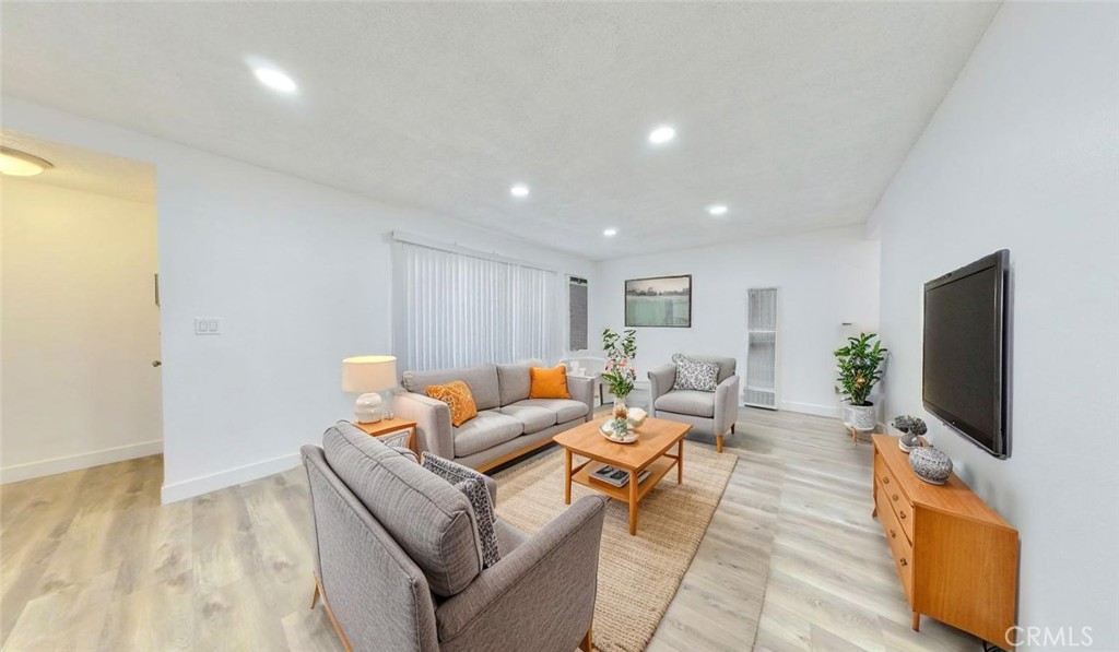 1648 Vía Mirada, Unit B Fullerton, CA 92833 - Photo 10 of 30 a living room with furniture and a flat screen tv