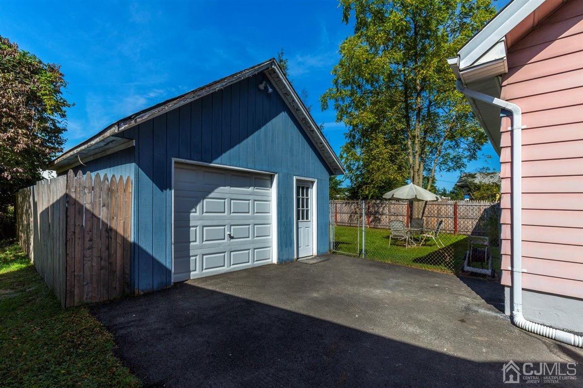 284 Old Post Road Edison, NJ 08817 - Photo 23 of 27 a front view of a house with a garage