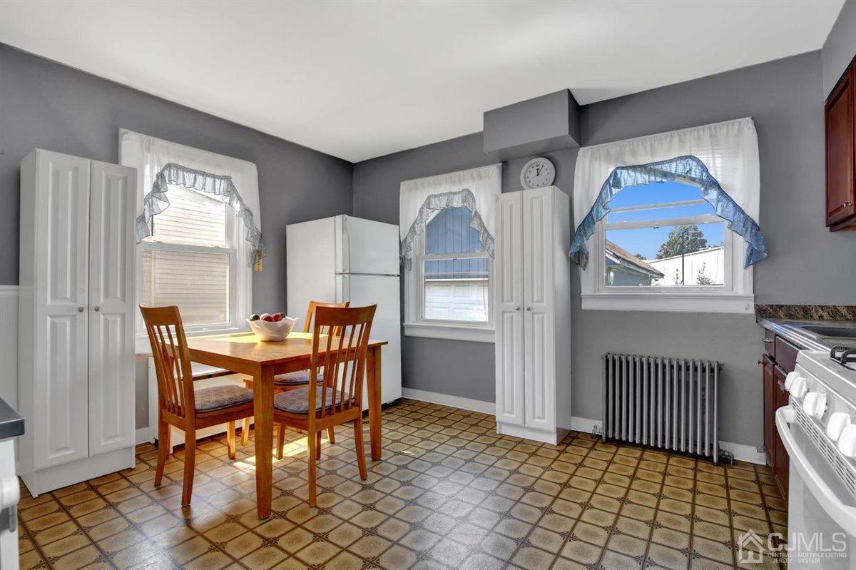 284 Old Post Road Edison, NJ 08817 - Photo 5 of 27 a view of a dining room with furniture and window