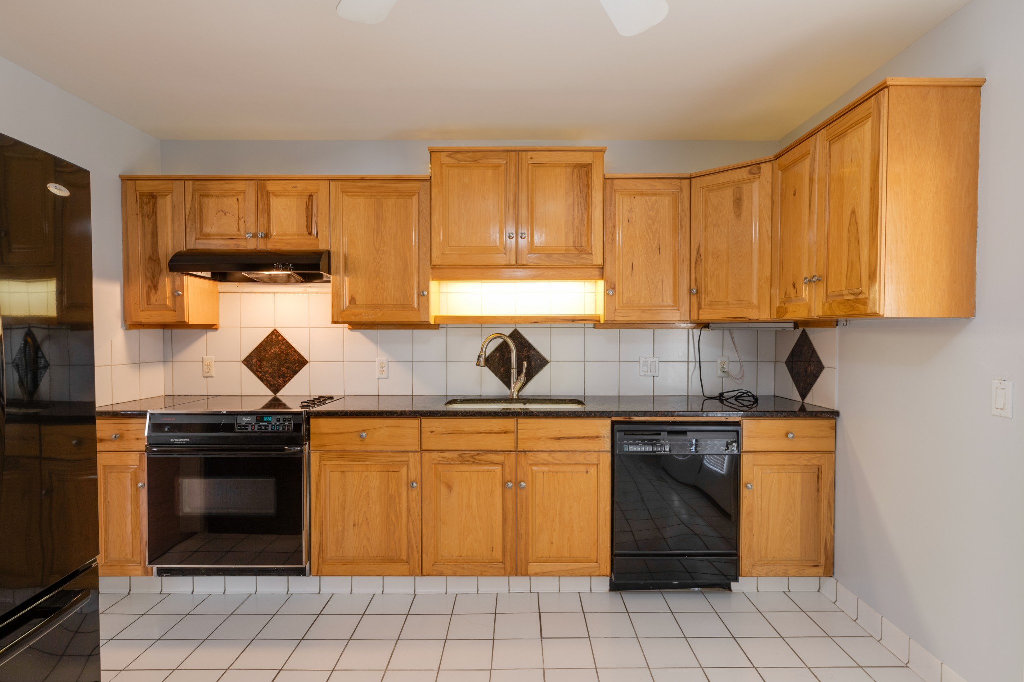 508 Ridgemont Drive Dickson, TN 37055 - Photo 17 of 44 a kitchen with a stove a sink and a cabinets
