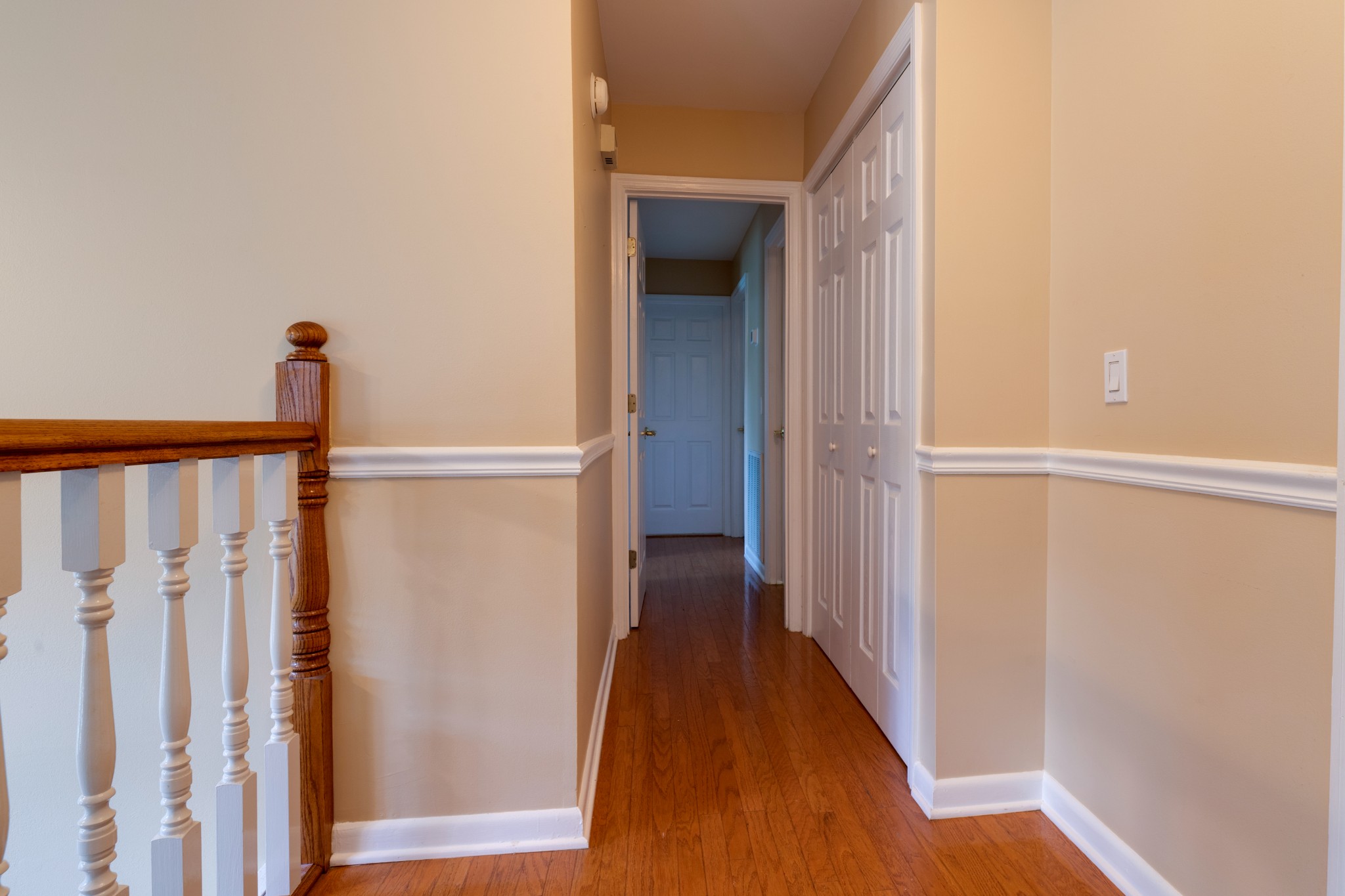 508 Ridgemont Drive Dickson, TN 37055 - Photo 20 of 44 a view of a hallway with wooden floor and staircase