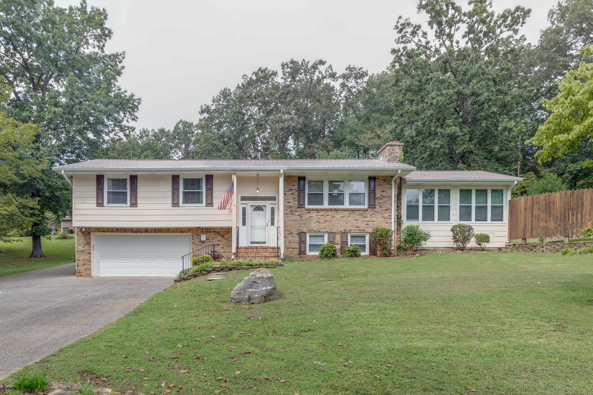 508 Ridgemont Drive Dickson, TN 37055 - Photo 2 of 44 a front view of house with a garden and trees