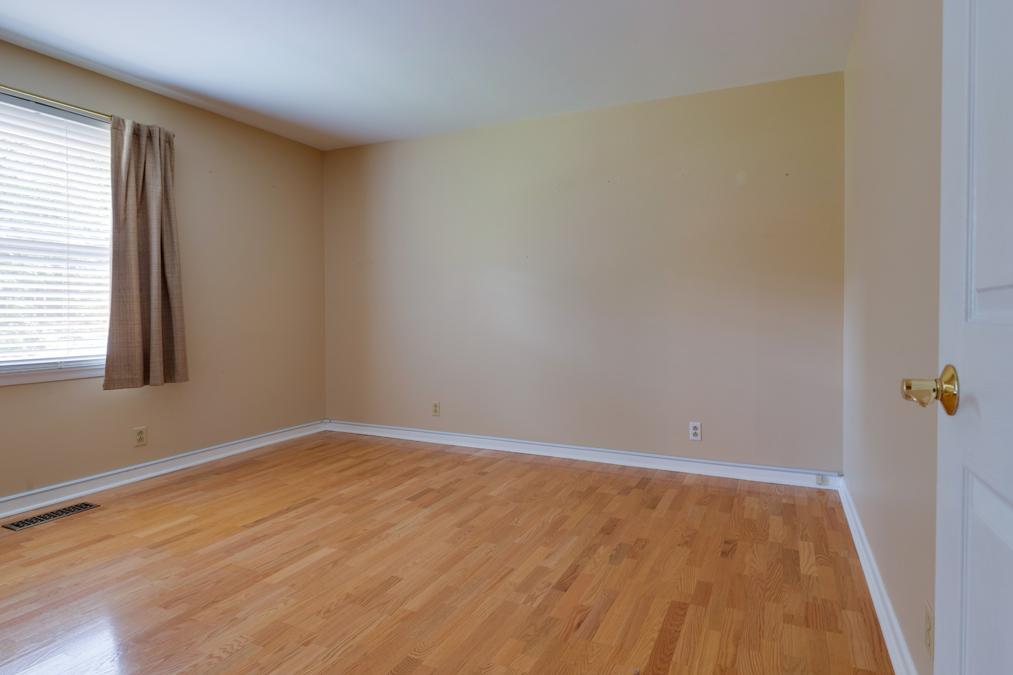 508 Ridgemont Drive Dickson, TN 37055 - Photo 25 of 44 an empty room with wooden floor and windows