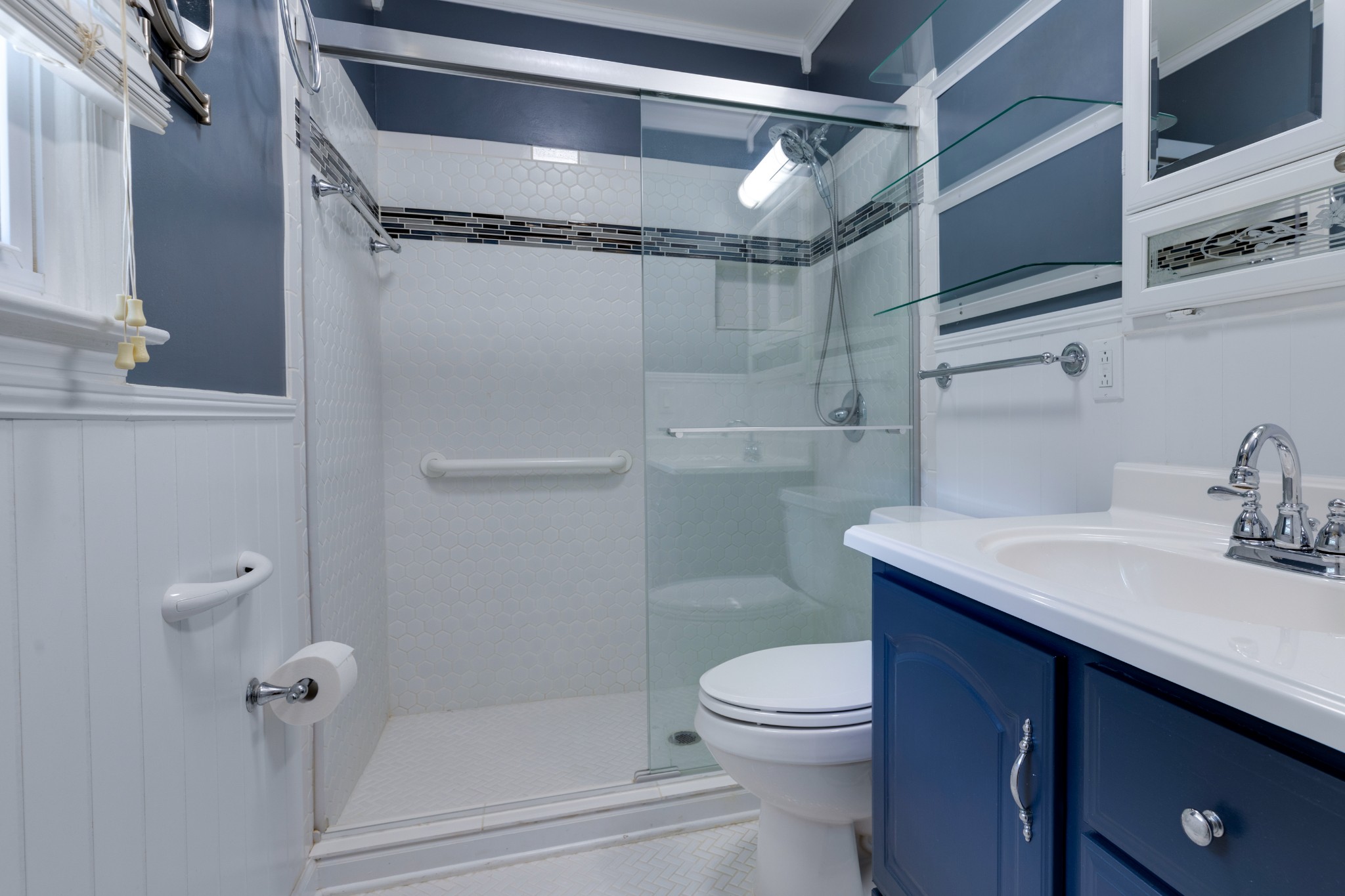 508 Ridgemont Drive Dickson, TN 37055 - Photo 29 of 44 a bathroom with a sink a toilet and shower