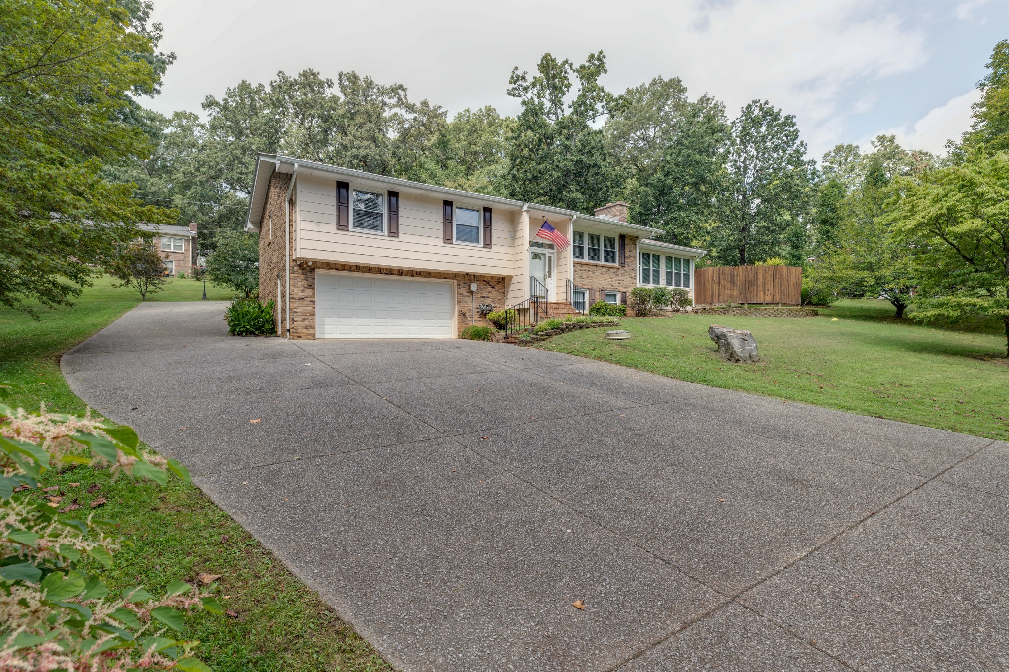 508 Ridgemont Drive Dickson, TN 37055 - Photo 41 of 44 a front view of a house with a yard and trees