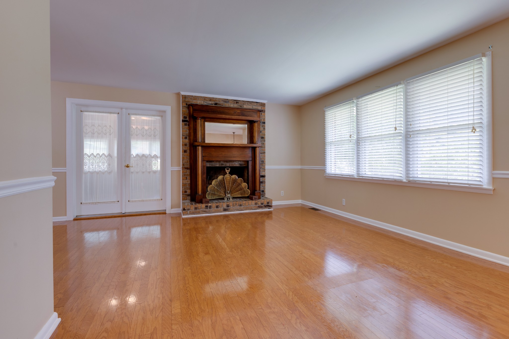 508 Ridgemont Drive Dickson, TN 37055 - Photo 8 of 44 an empty room with wooden floor and windows