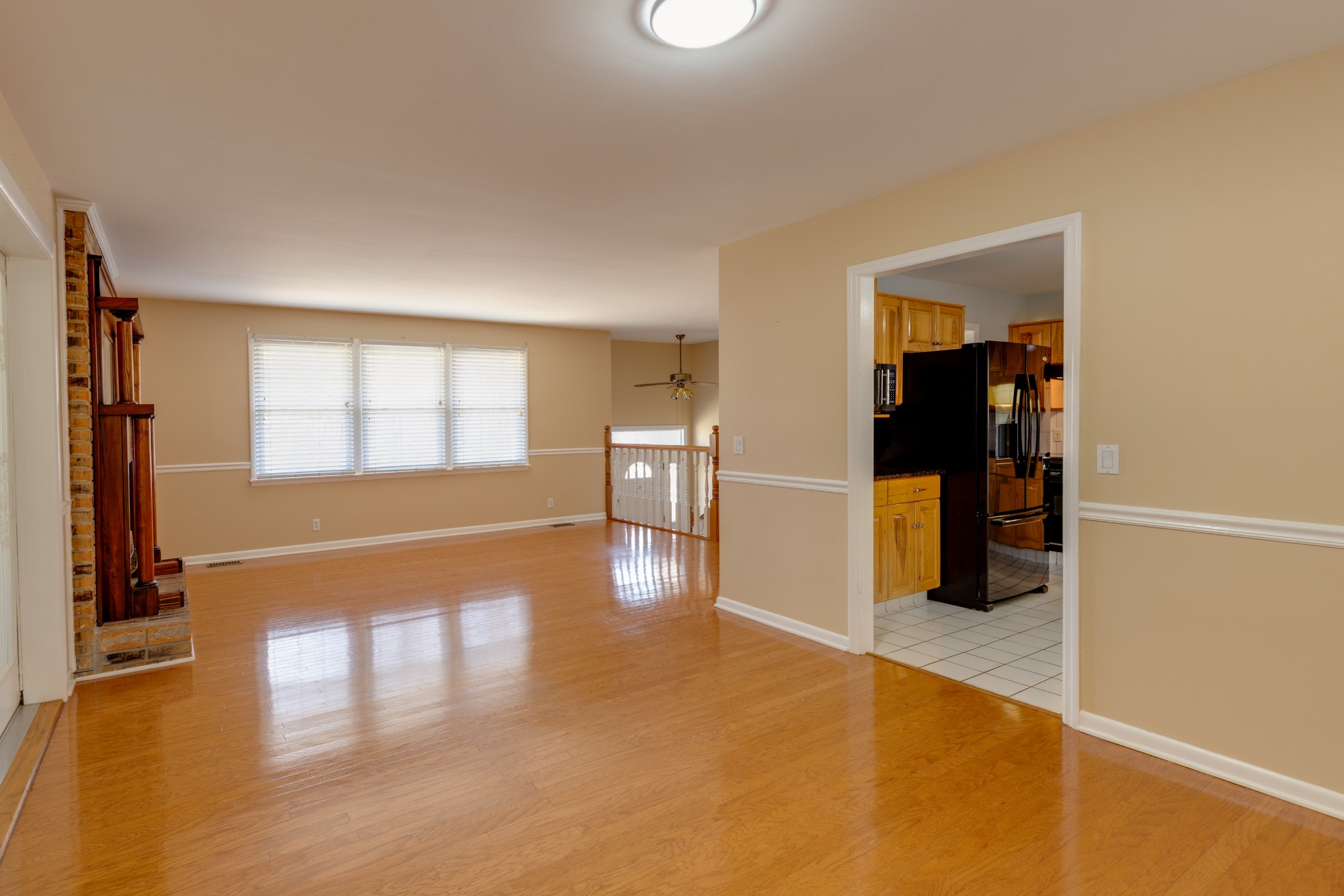 508 Ridgemont Drive Dickson, TN 37055 - Photo 10 of 44 wooden floor in an empty room with a window