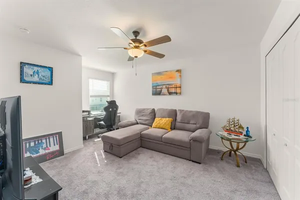 a living room with furniture and a table