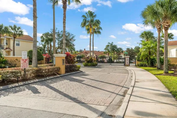 a view of a backyard with a fountain
