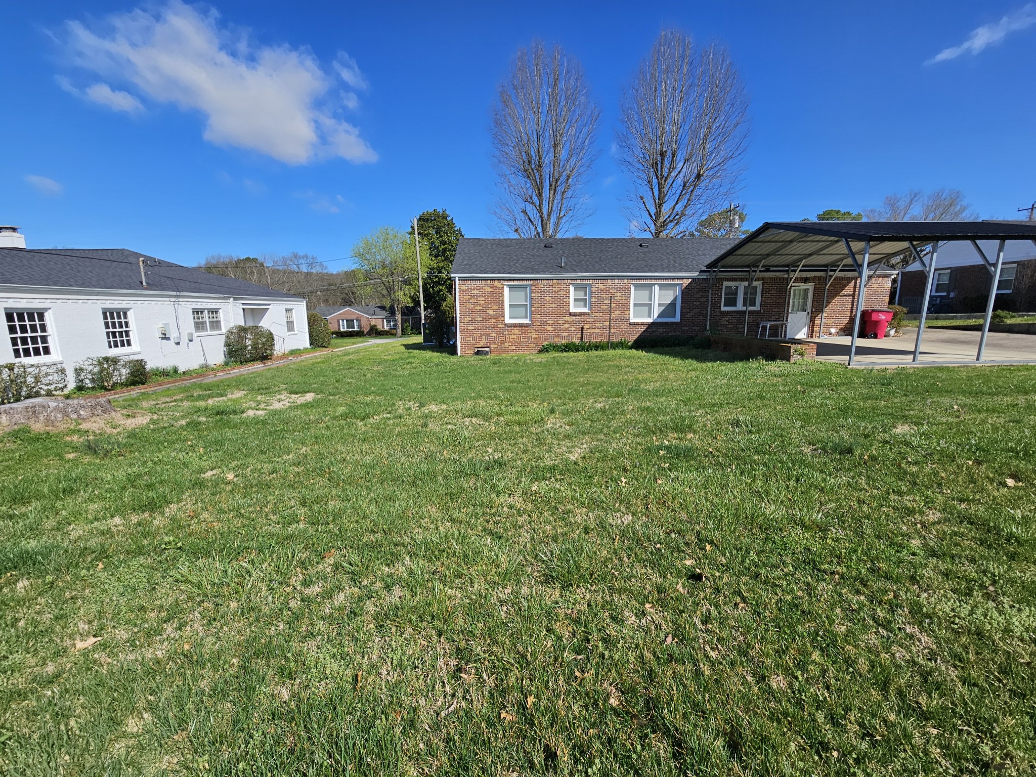 612 Jackson Avenue Carthage, TN 37030 - Photo 15 of 64 a front view of a house with a yard