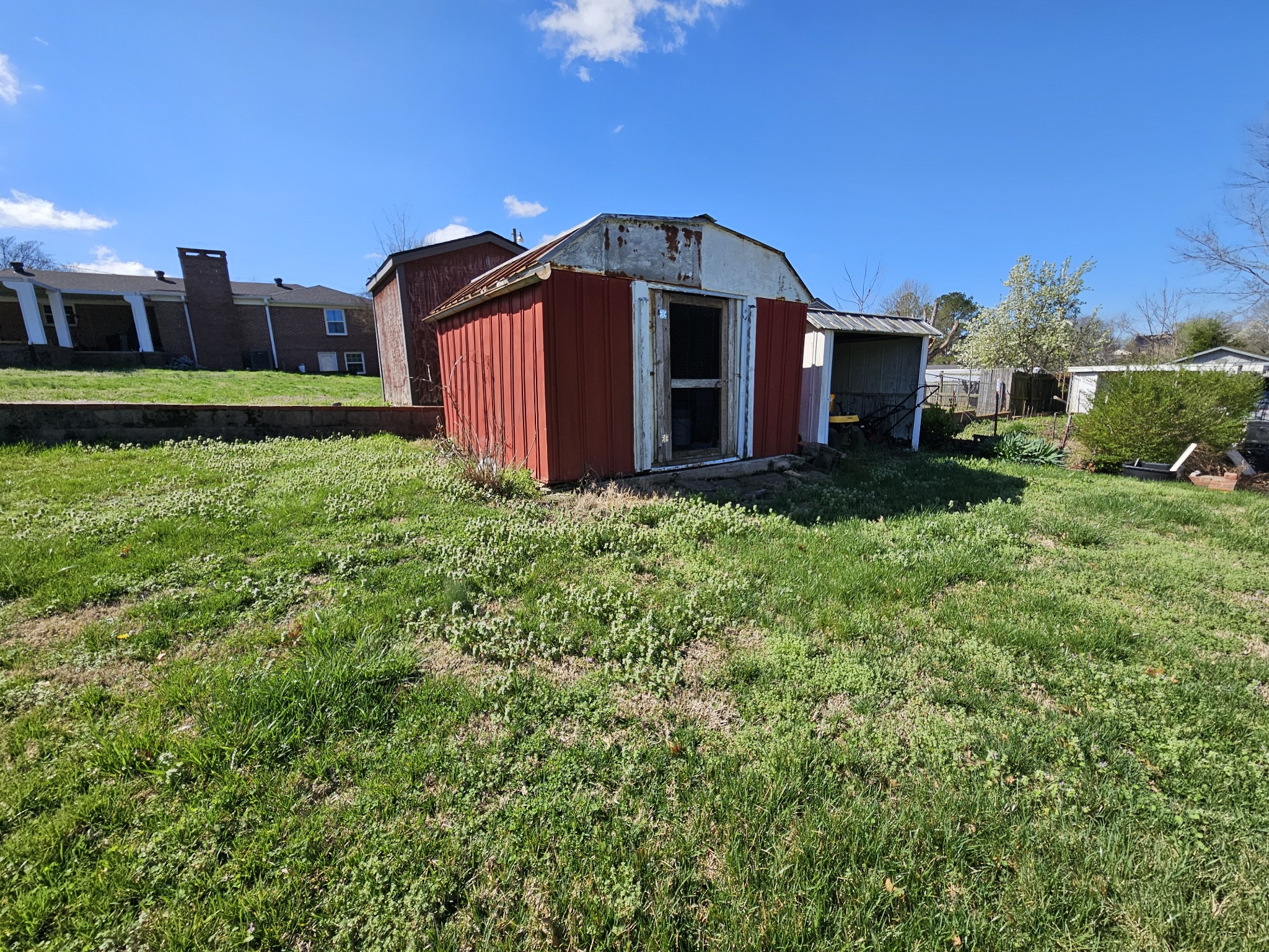 612 Jackson Avenue Carthage, TN 37030 - Photo 23 of 65 a view of a house with a yard and large trees