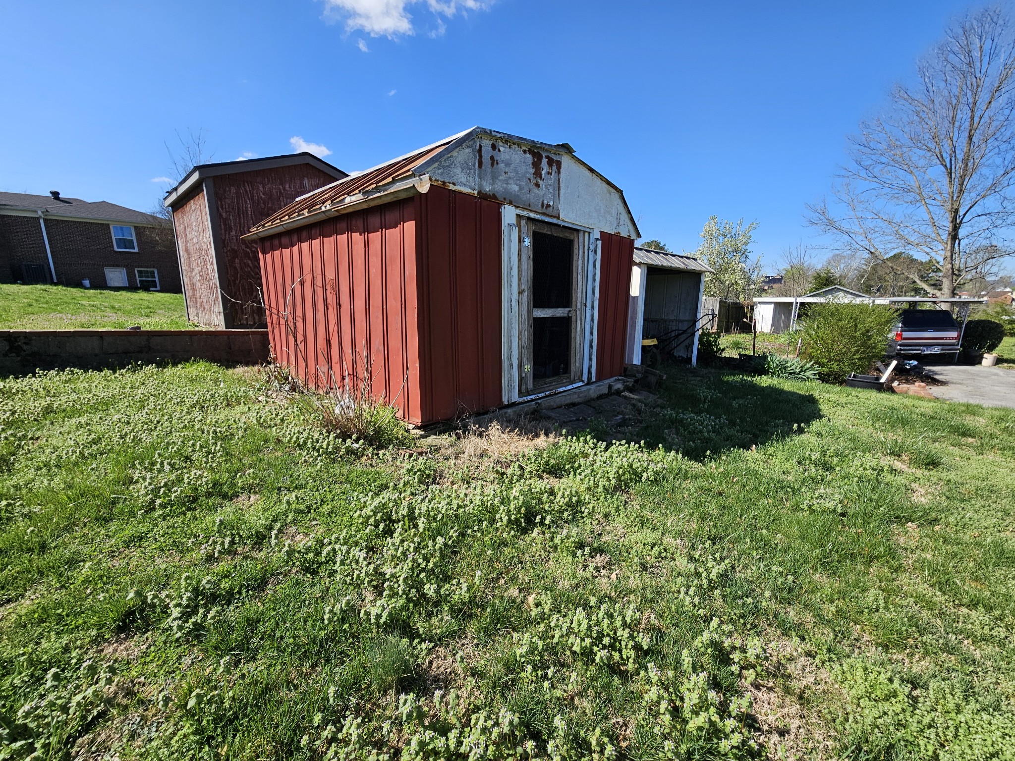 612 Jackson Avenue Carthage, TN 37030 - Photo 23 of 64 a view of a back yard of the house