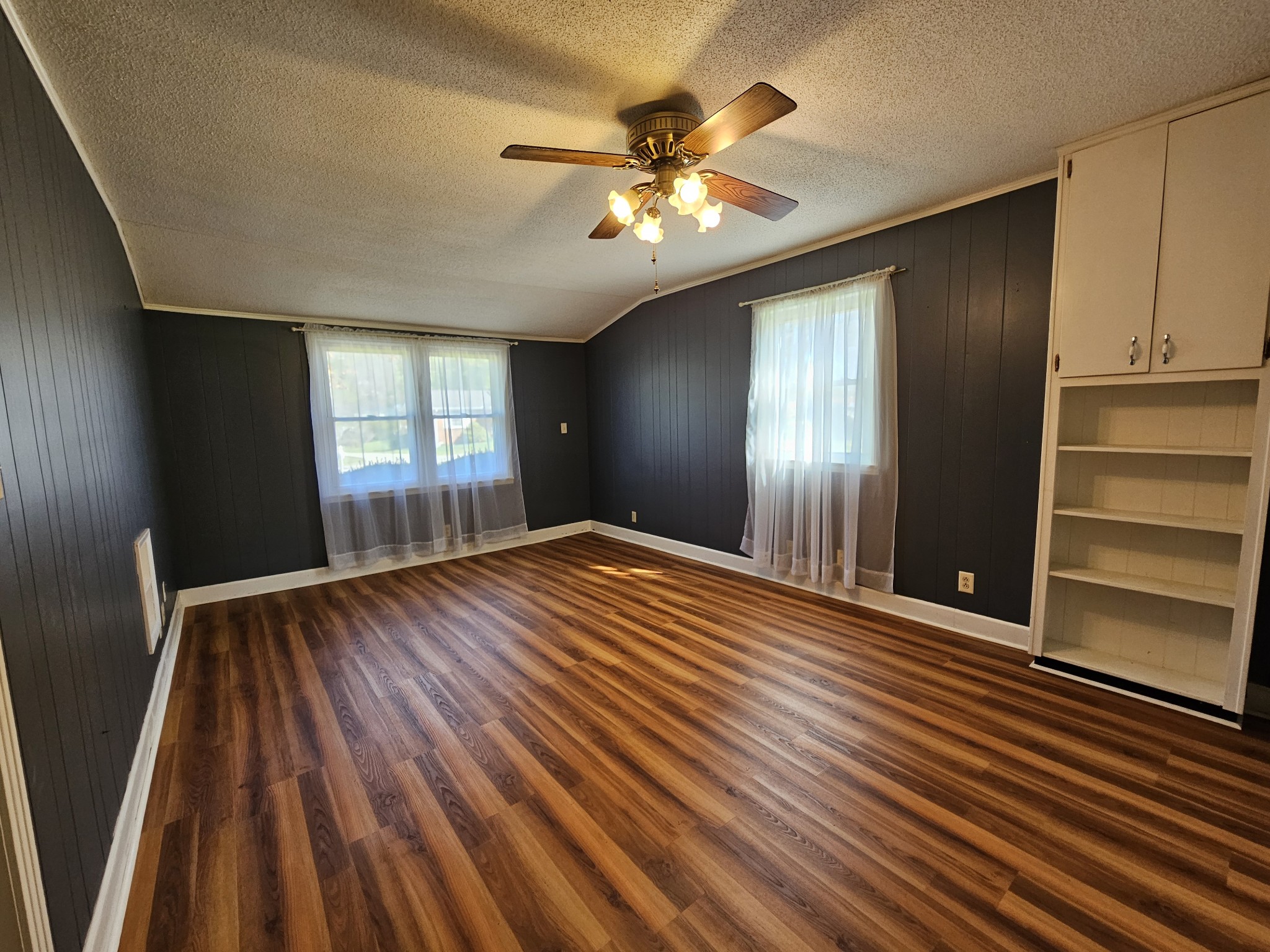612 Jackson Avenue Carthage, TN 37030 - Photo 29 of 65 wooden floor in an empty room with a window