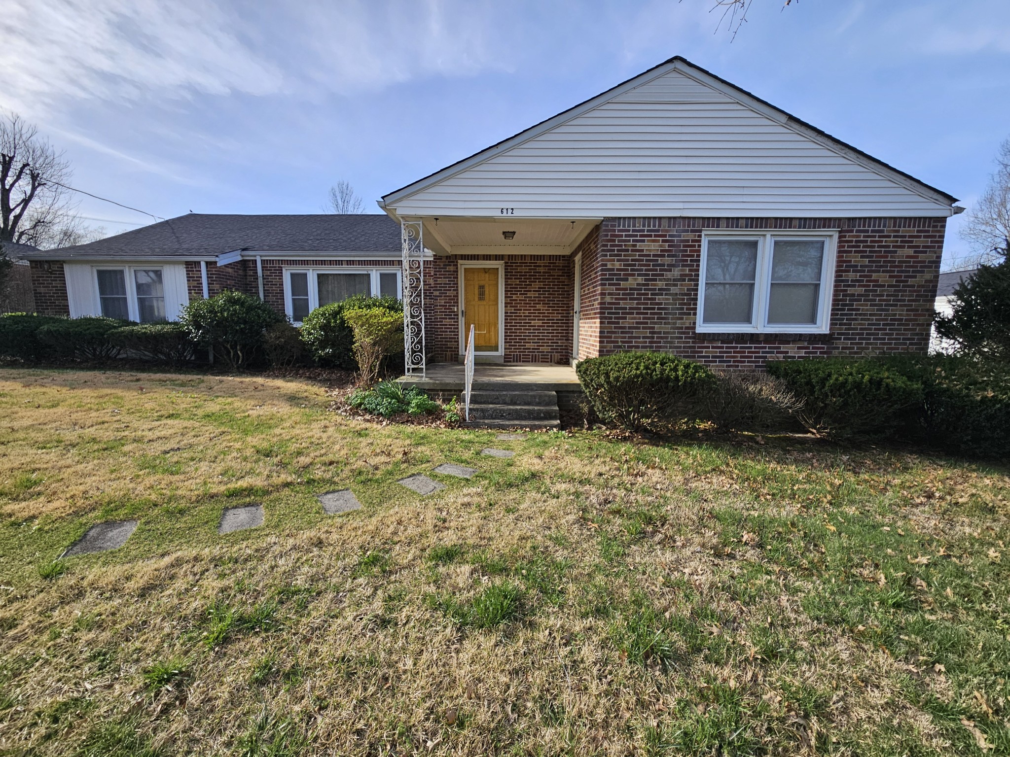 612 Jackson Avenue Carthage, TN 37030 - Photo 3 of 64 a front view of a house with garden