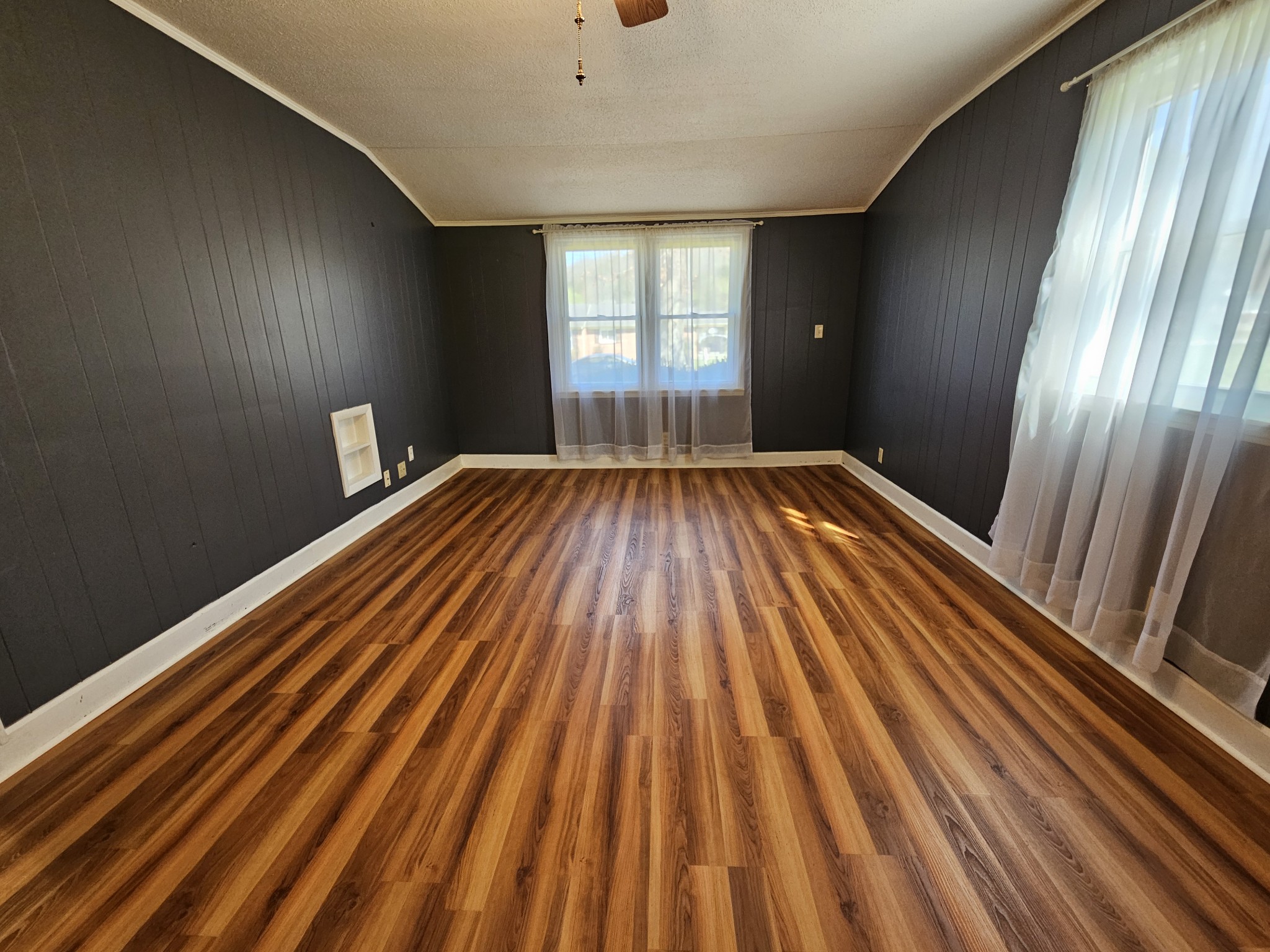 612 Jackson Avenue Carthage, TN 37030 - Photo 31 of 65 a view of empty room with wooden floor