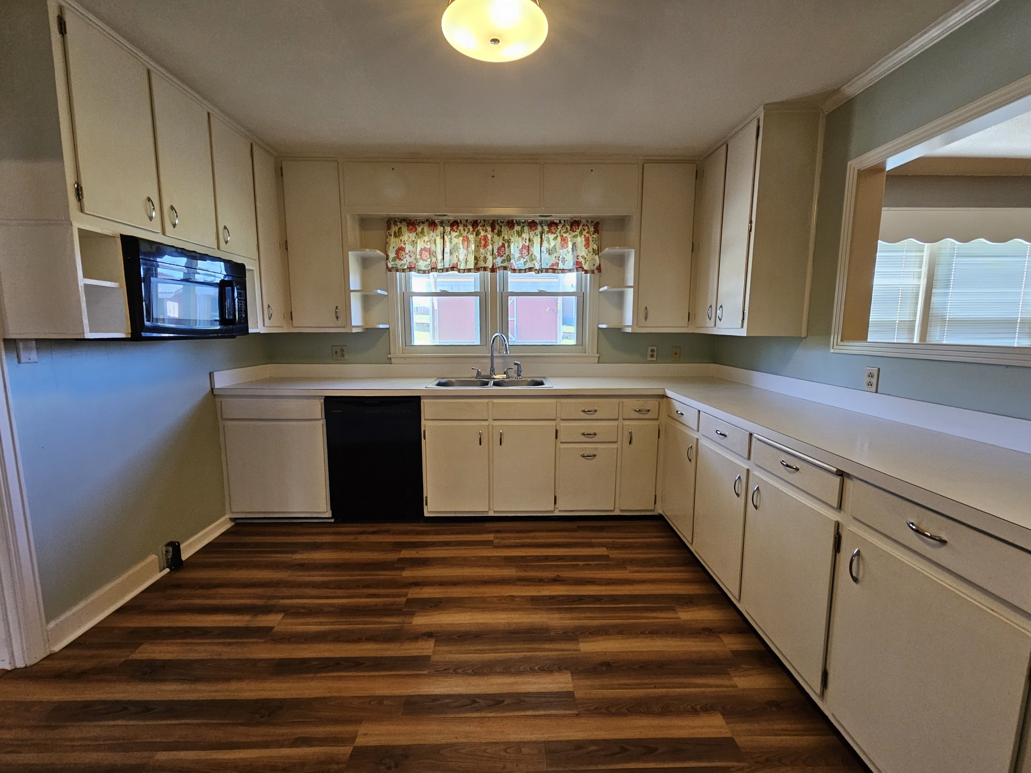 612 Jackson Avenue Carthage, TN 37030 - Photo 32 of 64 a kitchen with stainless steel appliances granite countertop a sink and cabinets